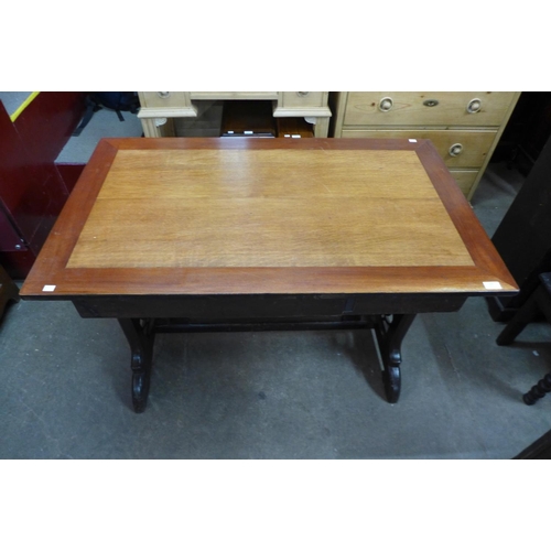 100 - A Victorian Gothic Revival oak library table (later top), 72cms h ,116cms w, 69cms d