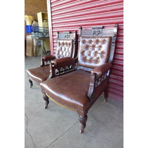 264 - A pair of Victorian carved mahogany and leather upholstered lady's and gentleman's armchairs