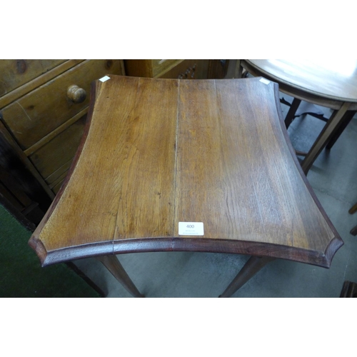 294 - An Arts and Crafts oak occasional table