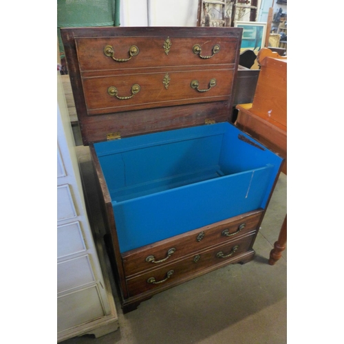 385 - A George III mahogany cabinet (converted from a commode)