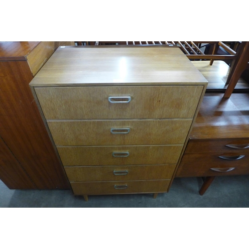 201 - A teak chest of drawers