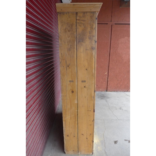 407 - A 19th Century French pine housekeeper's cupboard (extensive signs of woodworm)