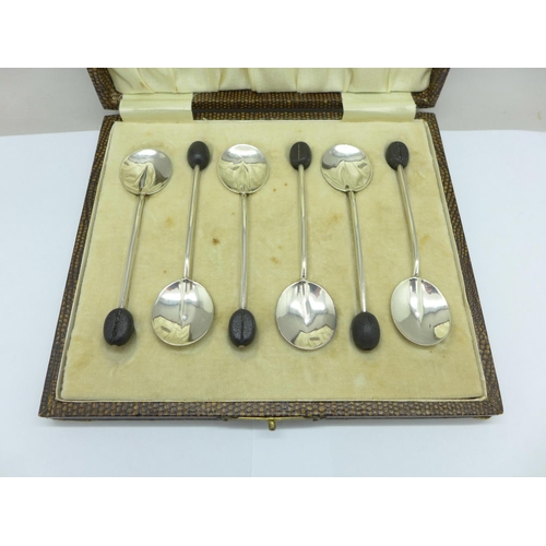 1007 - A cased set of six silver coffee bean spoons, Birmingham 1929, Adie Bros., 34g