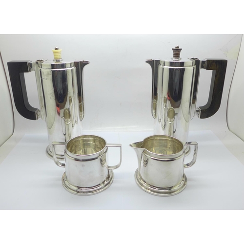 1046 - A 1940's Art Deco Indian silver four piece tea service by Hamilton & Co., Calcutta, total weight 142... 