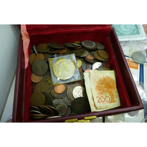 1048 - A collection of coins and bank notes