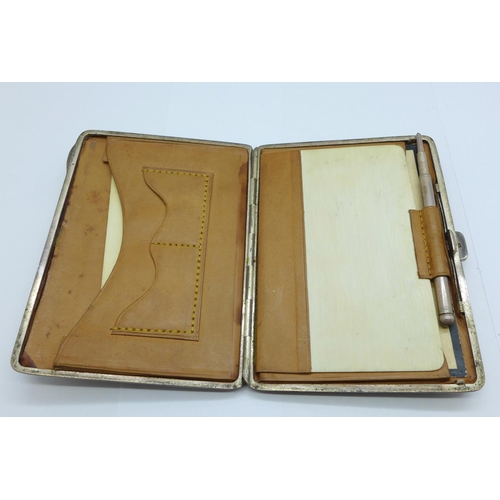 1050 - A silver purse/card case with note pad, Birmingham 1901, Synyer & Beddoes, with inscription 'W.S. Xm... 