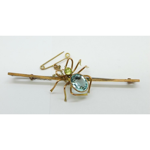 1068 - A 9ct gold spider brooch set with topaz and peridot, 3.6g, topaz approximately 9mm x 7mm, (a/f, repa... 