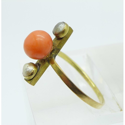 1069 - A yellow metal, coral and seed pearl ring, (tests as 9ct gold), 2g, O