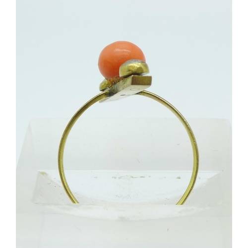 1069 - A yellow metal, coral and seed pearl ring, (tests as 9ct gold), 2g, O