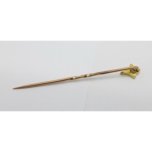 1073 - A yellow metal and diamond pin, (tests as 9ct gold), 1.2g