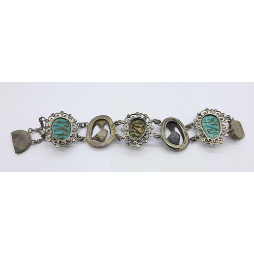 1077 - An Egyptian style faience scarab bracelet, tests as silver