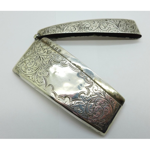 1092 - A silver card case, Birmingham 1907, (shallow dents, hinge strained)