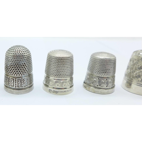 1100 - Four Charles Horner silver thimbles and three Dorcas thimbles