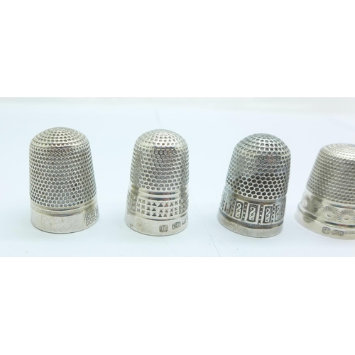 1100 - Four Charles Horner silver thimbles and three Dorcas thimbles