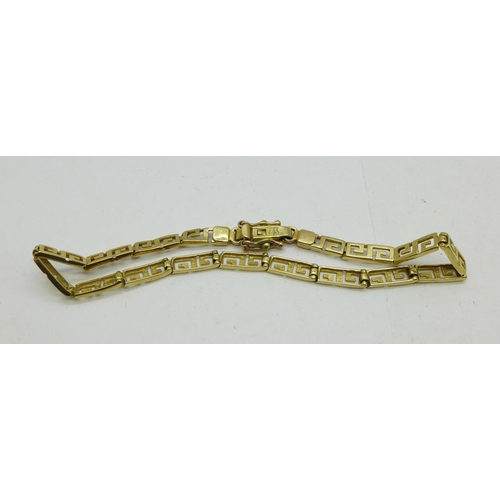 1120 - A 14ct gold Greek meander design bracelet, marked 585, 6.1g