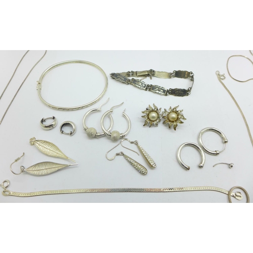 1134 - Six silver chains, three silver bracelets, a silver bangle and six pairs of earrings, three pairs a/... 