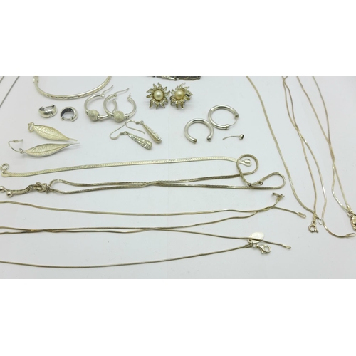 1134 - Six silver chains, three silver bracelets, a silver bangle and six pairs of earrings, three pairs a/... 