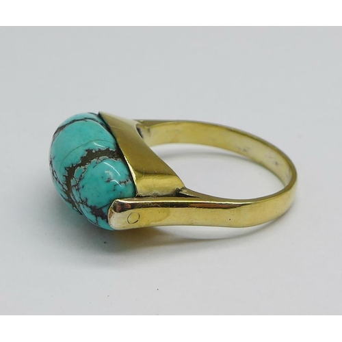 1143 - A silver gilt turquoise matrix ring, M/N