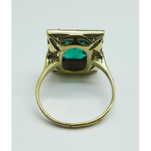 1145 - A silver gilt, green and white stone ring, P