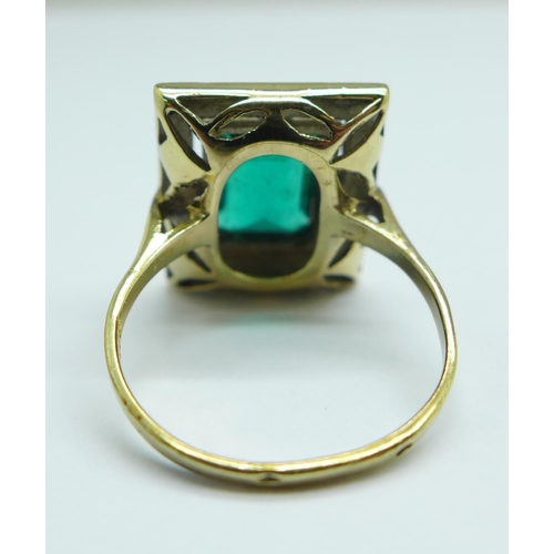 1145 - A silver gilt, green and white stone ring, P