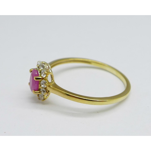 1149 - A silver gilt, ruby and zircon ring, T