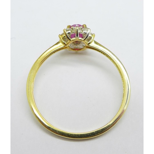 1149 - A silver gilt, ruby and zircon ring, T