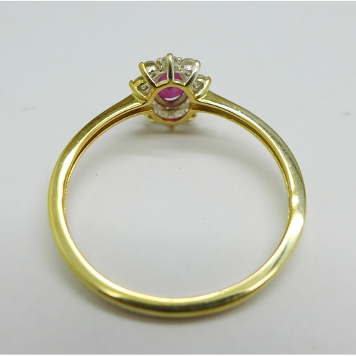 1149 - A silver gilt, ruby and zircon ring, T