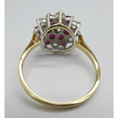 1151 - A 9ct gold, ruby and white stone cluster ring, 3g, Q