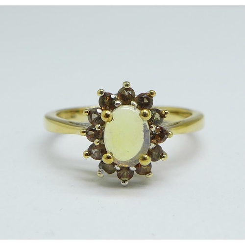 1155 - A silver gilt and moonstone ring, P