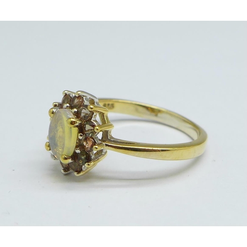 1155 - A silver gilt and moonstone ring, P