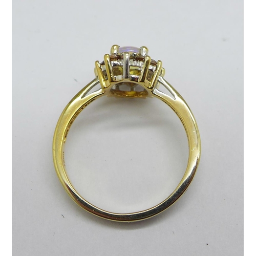 1155 - A silver gilt and moonstone ring, P