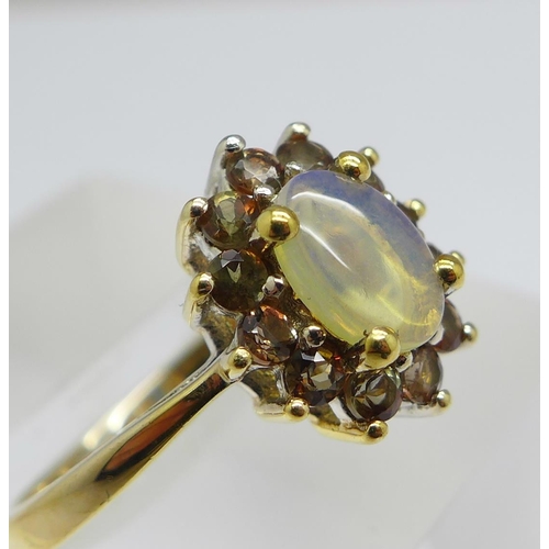 1155 - A silver gilt and moonstone ring, P