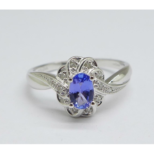 1156 - A 9ct gold, tanzanite and diamond ring, 2.6g, O