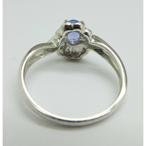 1156 - A 9ct gold, tanzanite and diamond ring, 2.6g, O