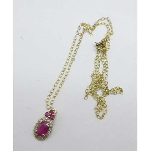 1158 - A 9ct gold, ruby and diamond pendant on a fine 925 silver gilt chain, pendant 0.8g