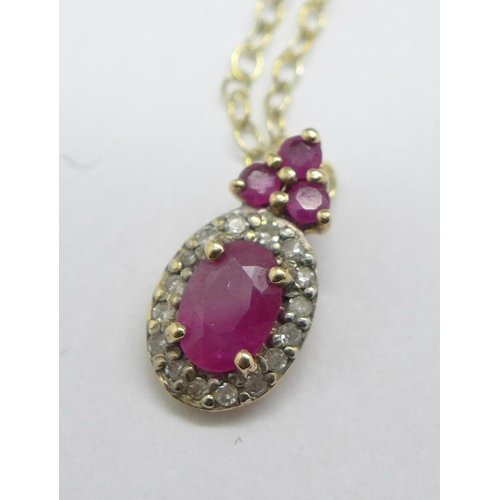 1158 - A 9ct gold, ruby and diamond pendant on a fine 925 silver gilt chain, pendant 0.8g