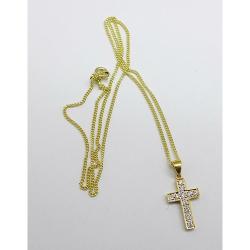 1163 - An 18ct gold and diamond cross pendant on a 9ct gold chain, total weight 3.5g, cross 15mm x 10mm