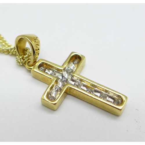 1163 - An 18ct gold and diamond cross pendant on a 9ct gold chain, total weight 3.5g, cross 15mm x 10mm