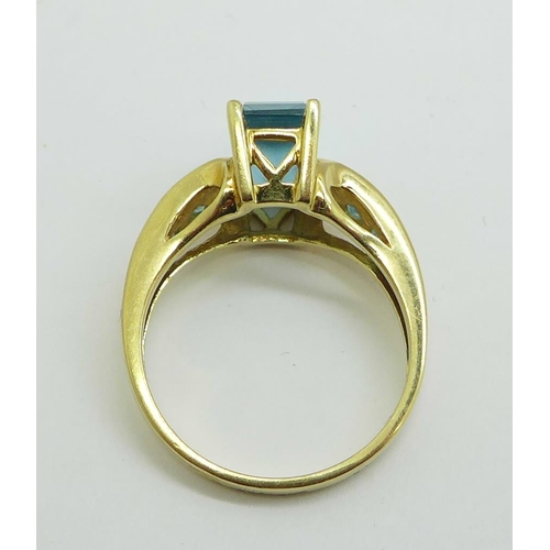 1168 - A 9ct gold and blue stone ring, 4.9g, Q, lacking one stone