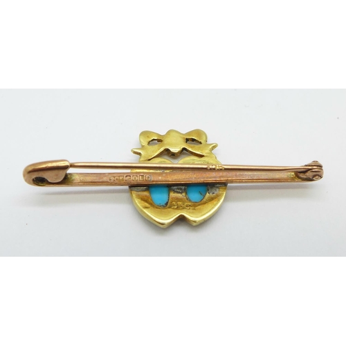 1180 - A 9ct gold bar brooch mounted with a 15ct gold, turquoise and seed pearl plaque, total weight 2.6g