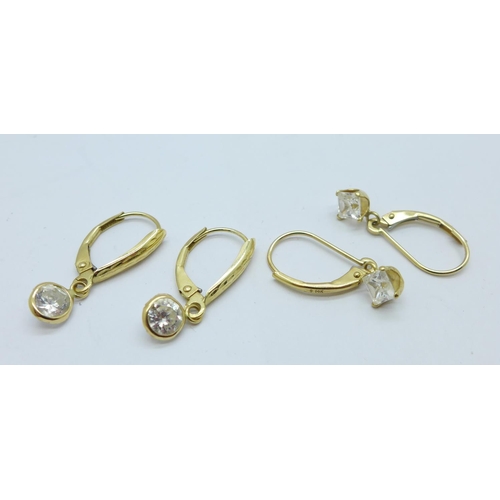 1193 - Two pairs of 14ct gold and white stone earrings, total weight 2.3g