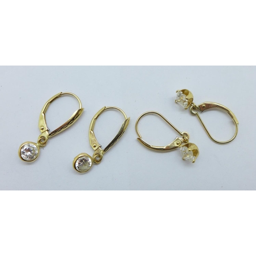 1193 - Two pairs of 14ct gold and white stone earrings, total weight 2.3g