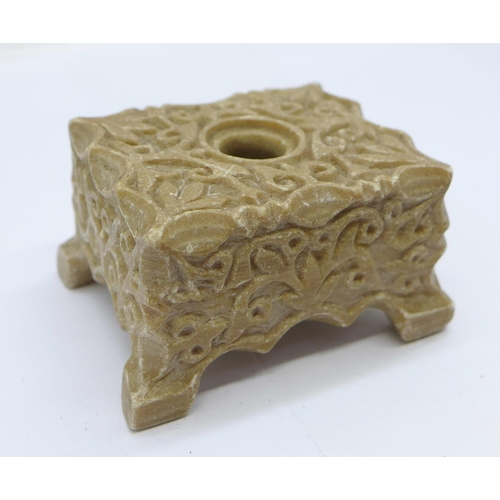 1206 - A carved soapstone incense holder with writing on the base and three other carved items, two a/f