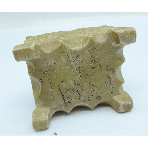 1206 - A carved soapstone incense holder with writing on the base and three other carved items, two a/f