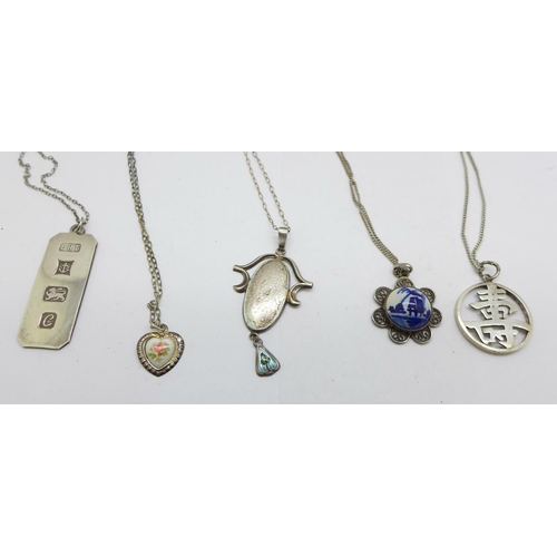 1221 - Five silver pendants and chains including one by Charles Horner lacking enamel