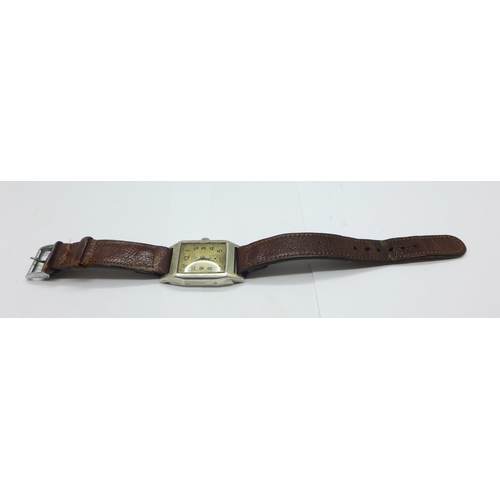 1234 - A gentleman's silver cased wristwatch