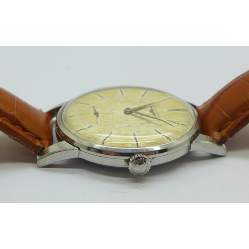 1239 - A Longines manual wind wristwatch with sub second dial, long service inscription to case back dated ... 