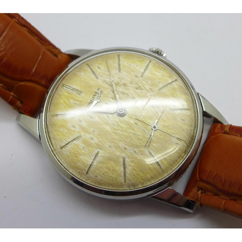 1239 - A Longines manual wind wristwatch with sub second dial, long service inscription to case back dated ... 