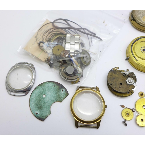 1249 - A sterling silver pocket watch, a/f, and assorted watch parts