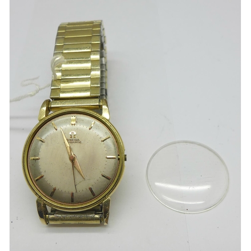 1253 - A gold plated Omega automatic wristwatch, the case back bears inscription dated 1960, glass loose an... 